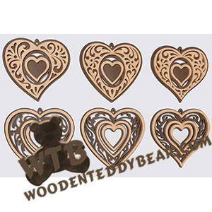 Finished example of Nested Hearts in Hearts Ornaments | A Fretwork Scroll Saw Pattern from The Wooden Teddy Bear